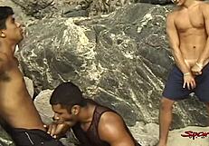 Two Dudes Mouth Fucking Tanned Twink On Beach