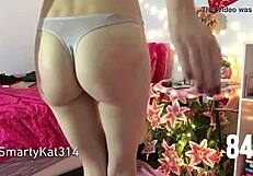 Spanks her own bottom in solo session