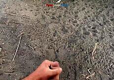 brunette masturbates cock under bridge in homemade solo