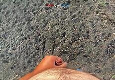 brunette masturbates cock under bridge in homemade solo