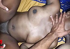 A Black woman attractive, desires to be intimate with two men, performs oral sex with both males at the same time