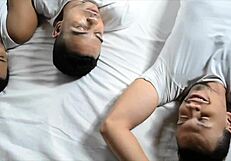 The new year's eve party ends provocatively in gay threesome sex with spicy guys and their monster cocks