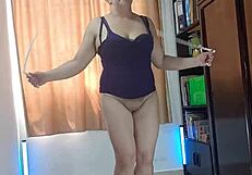 A slutty wife of his, a latina beauty strips and performs some hot workout moves on Halloween.