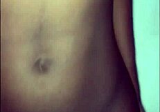 A petite amateur dances seductively while whining