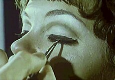 in a retro hospital, the vintage nurse cares for her patient with antique tools