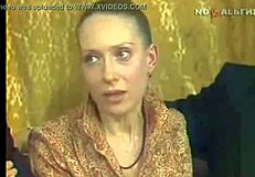 Sad mature lady reads poetry with amazing intonation and wide legs