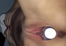 Young Russian amateur trying bottle tricks in hot Moscow setting