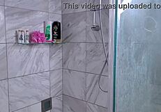 Watch Maxine Tease Her Huge Tits While Washing Up?