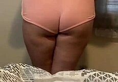 Hot and sexy Latina in shorts, teasing and showing her ass.