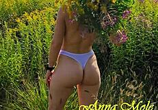 public erotica with anna mole, her small gorgeous breasts shine in nature shorts