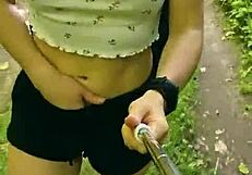 public erotica with anna mole, her small gorgeous breasts shine in nature shorts