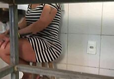 A lady with big tits visits the necroterio.