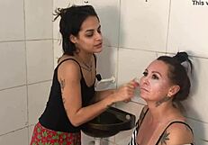 A lady with big tits visits the necroterio.