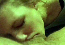 Submissive blonde on her knees giving blow job to a big cock