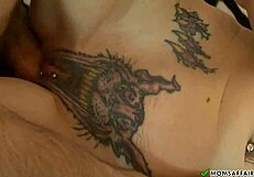 mature inked blonde milf with tattoos