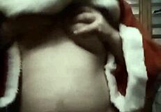 Natale massages her natural tits on show.