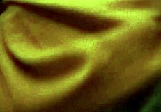 Natale massages her natural tits on show.