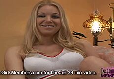 Beautiful blonde gets a tan and performs a solo striptease with a vibrator.