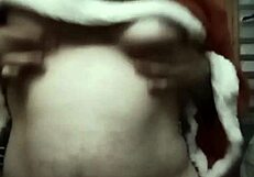 Natale massages her natural tits on show.