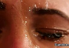 Slutty doll gets cum shot on her face sucking all the jizm