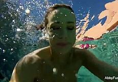 i enjoy some pool fun with abigail mac, showing off my big tits and nude body.