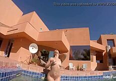i enjoy some pool fun with abigail mac, showing off my big tits and nude body.