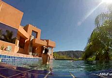i enjoy some pool fun with abigail mac, showing off my big tits and nude body.