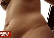 A big-titted transsexual in crossdressing attire wanks her cock solo outdoors