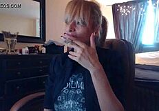 Amateur blonde Sandi shows her big cans and squirts while smoking a cigarette