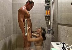 A blonde girlfriend of my friend had a shower while her boyfriend was playing video games on Sony PlayStation.