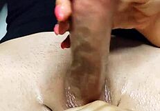 Oiled Tits Lead to Explosive Cumshot from Handjob