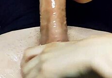 Oiled Tits Lead to Explosive Cumshot from Handjob