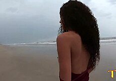 Young Brazilian beauty Manoella Fernandes gets naughty on the beach