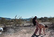 Sex adventure on desert roadside with hot couple