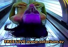 Solarium horny milf with big breasts can’t stop masturbating under lights. I’m so turned on by her daring public display!