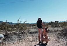 Sex adventure on desert roadside with hot couple