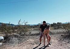 Sex adventure on desert roadside with hot couple