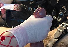 Mistress teases my cock with white gloves and dilator