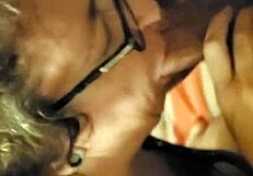 mature woman performs oral on stepson