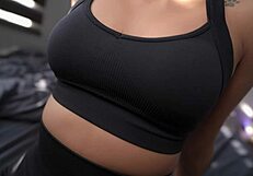 Latina fitness enthusiast gets off to workout routine