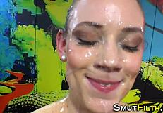 Bukkake drenched woman participates in act