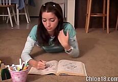 The teen pokes a crayon into her tight cunt