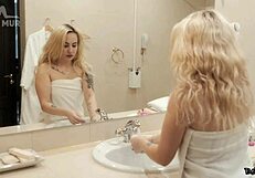 Girl with bubble butt cares for herself in shower.