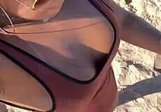 Big tits babe shows tan mark in VIP