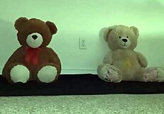 Enjoying a fun threesome with furry toy bears