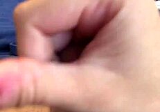 Male jerks off intensely on bed, losing NNN challenge with big cumshot.