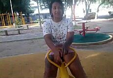 Pair of colombian women enjoy mutual pleasure in the public park.