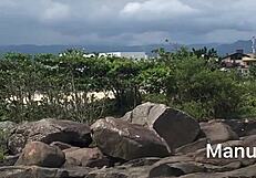 Manu Fox naked and fingering on the beach