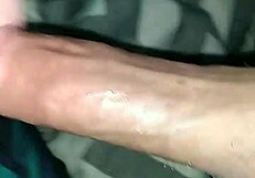 A mature milf performs a sloppy blowjob on a young big black cock and squirts everywhere