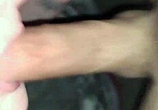 A mature milf performs a sloppy blowjob on a young big black cock and squirts everywhere